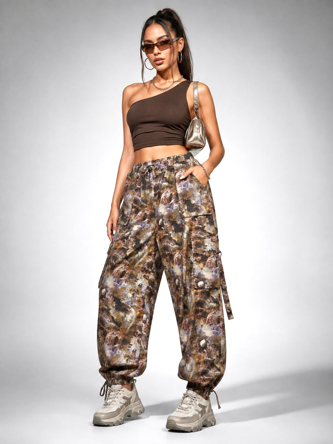 The Ragged Priest Y2K abstract print cargo parachute pants front view