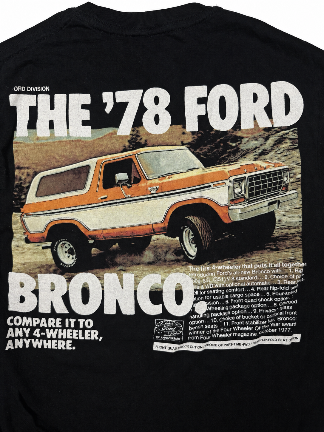 Close-up view of '78 Ford Bronco back graphic on black T-shirt