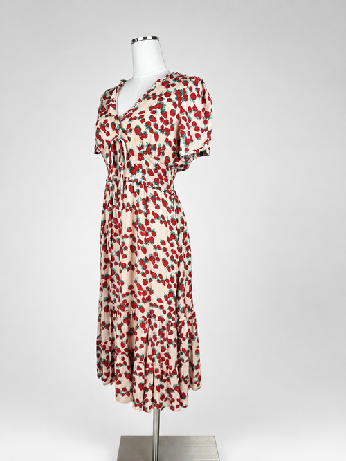 Betsey Johnson strawberry print midi dress front view showing puff sleeves and tie front