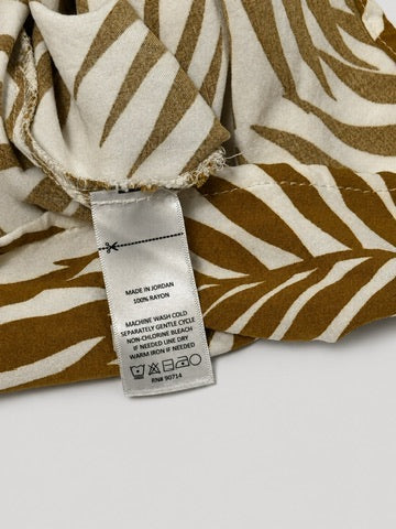 Ivy Street palm print rayon jumpsuit care label detail