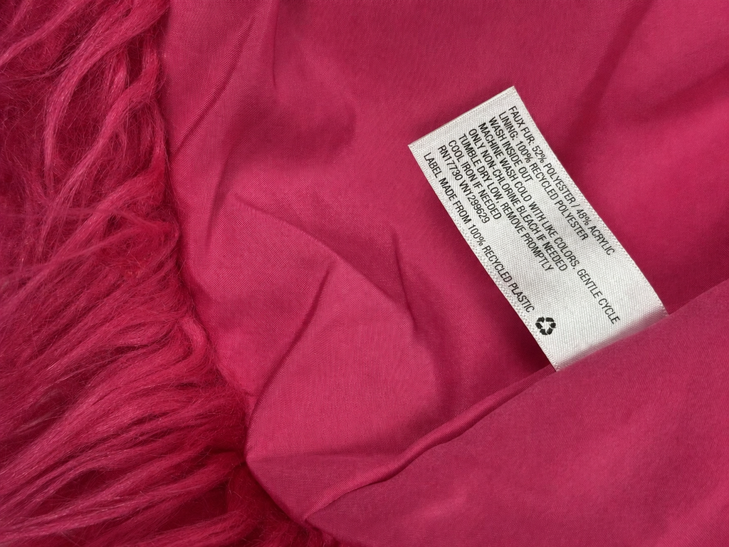 Back view of Wild Fable hot pink shaggy faux fur cropped jacket on mannequin