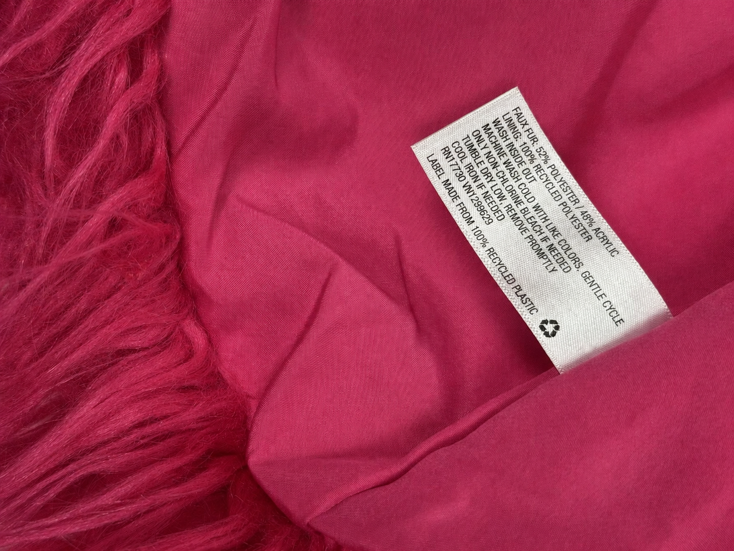 Back view of Wild Fable hot pink shaggy faux fur cropped jacket on mannequin