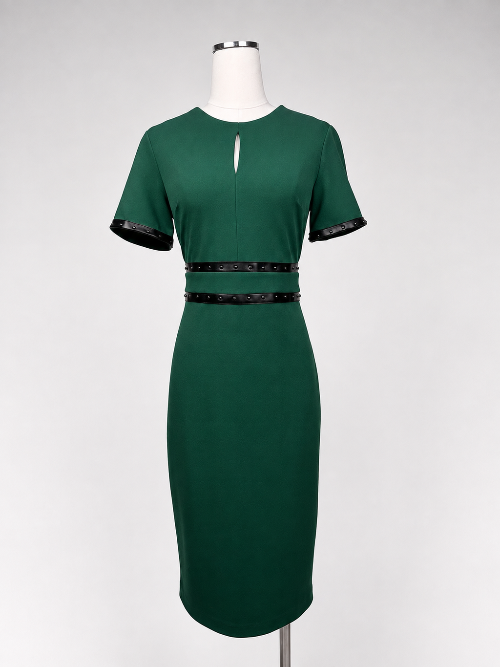 Emerald green Joseph Ribkoff dress on model with cocktail styling