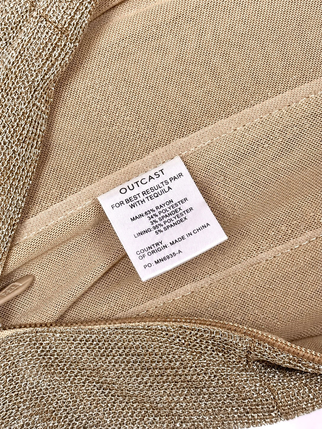 Outcast gold strapless neckline and bodice detail