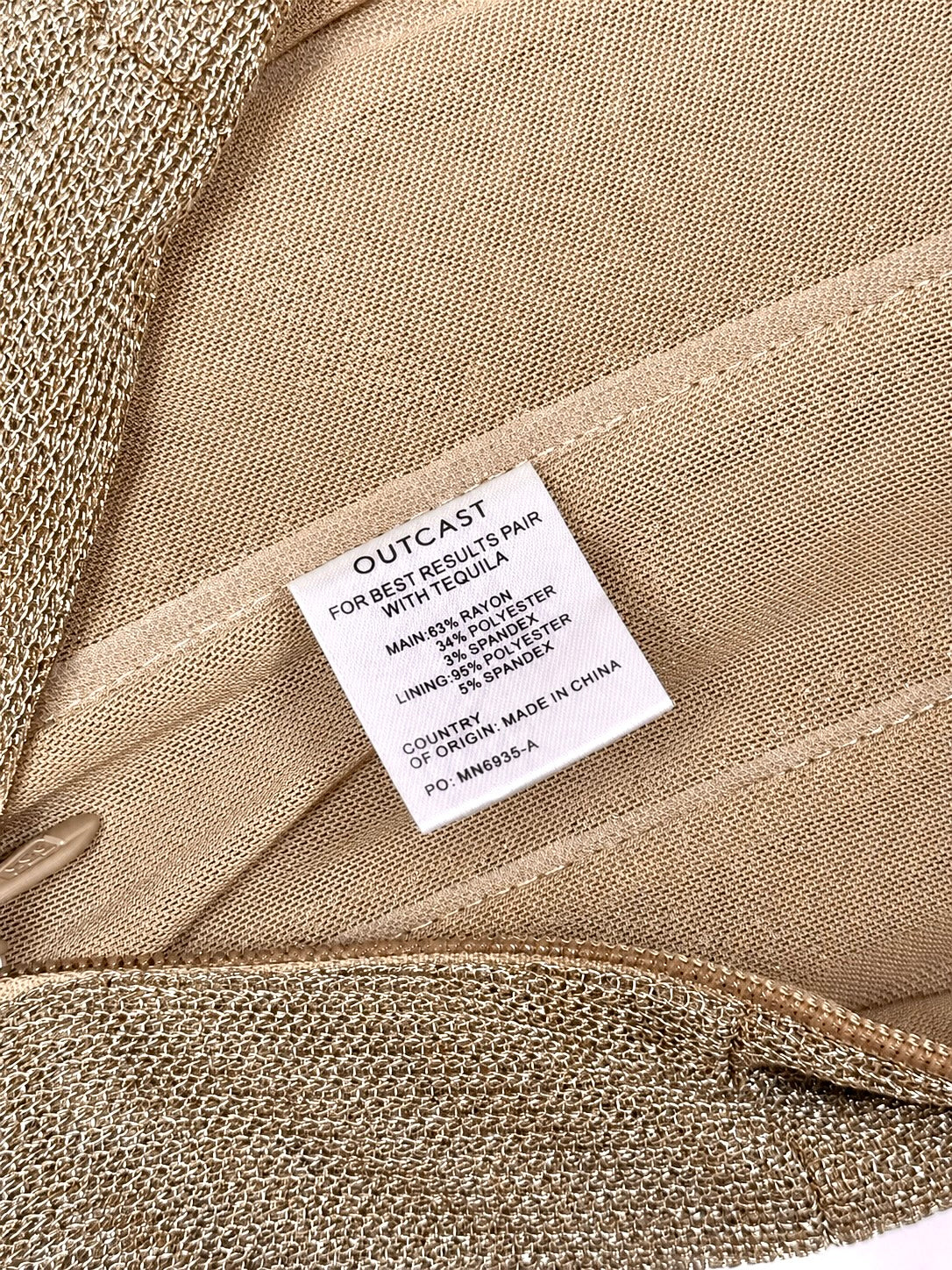Outcast gold strapless neckline and bodice detail