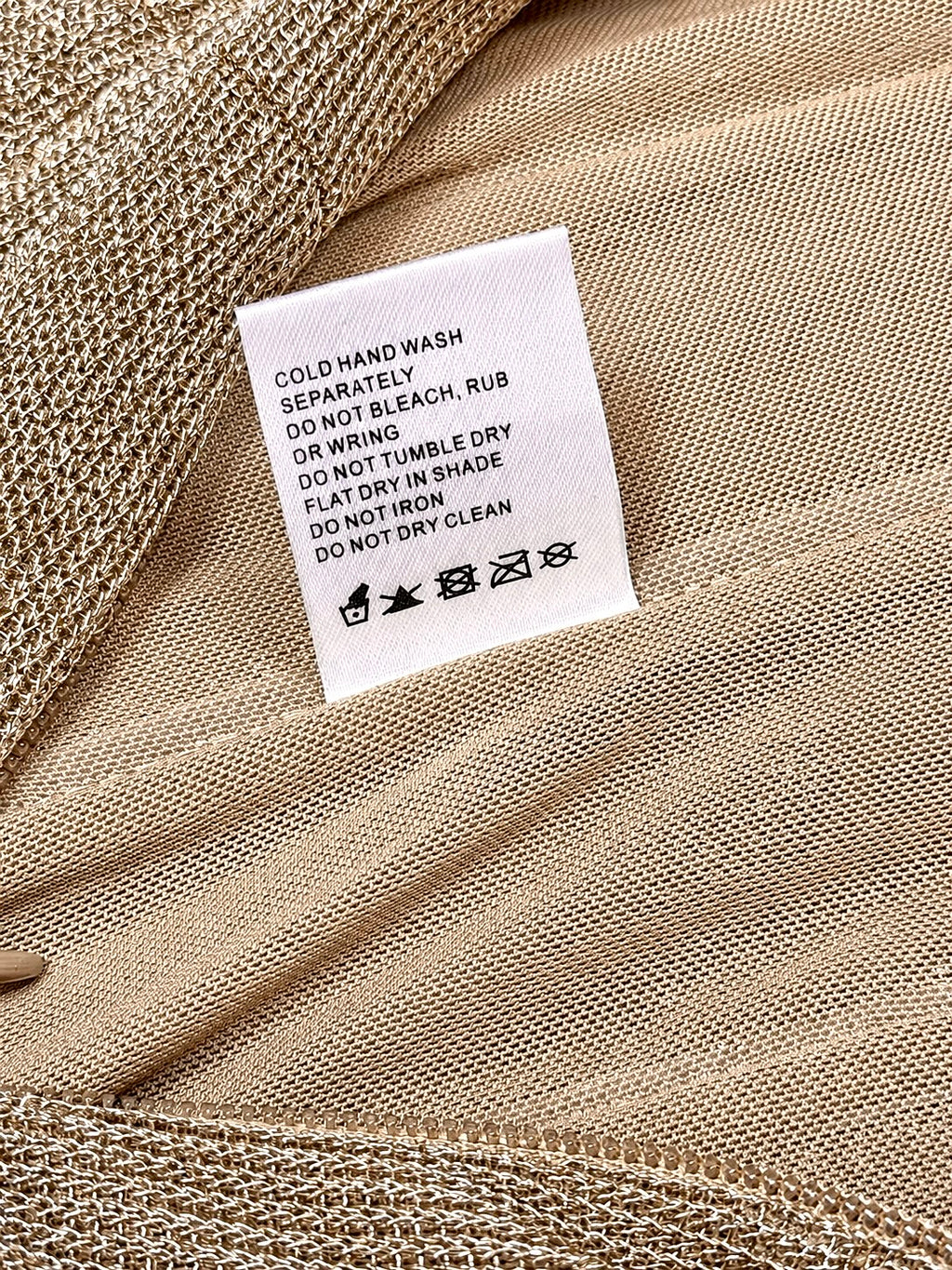 Outcast size small gold dress label and lining