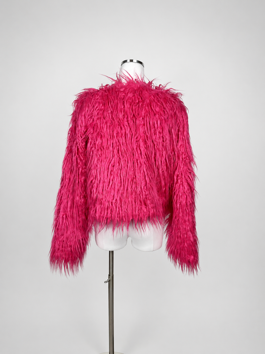 Side view of Wild Fable hot pink faux fur cropped jacket showing sleeve drape and cropped hem
