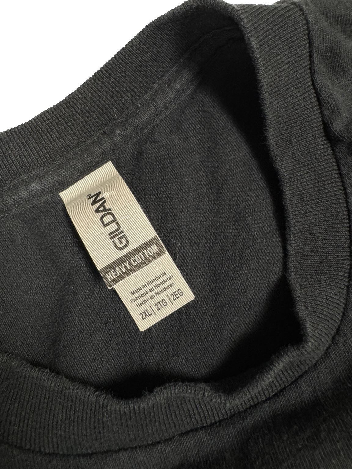 Gildan Heavy Cotton neck label showing 2XL on black graphic T-shirt