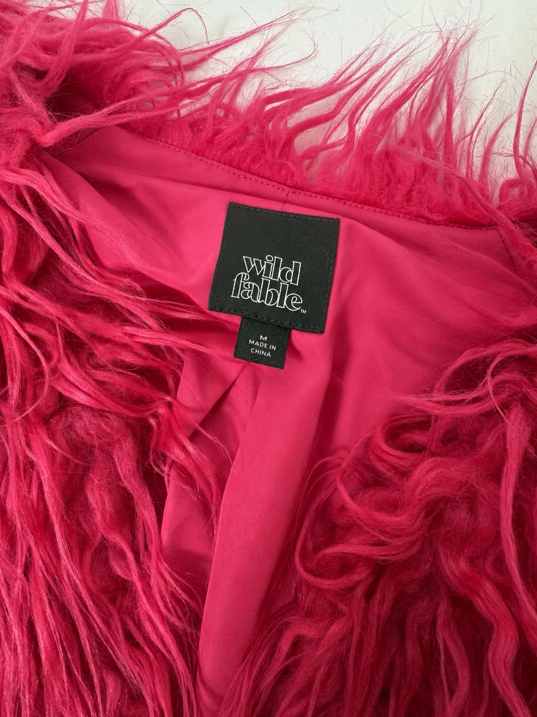 Wild Fable size Medium jacket tag and satin-feel pink lining