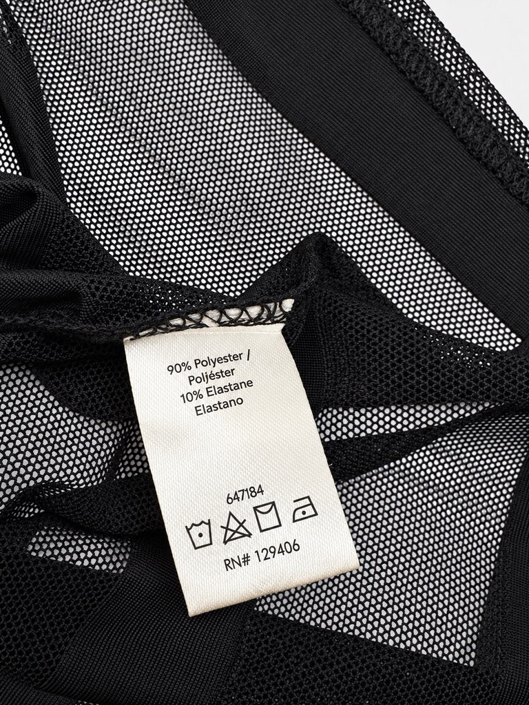 VENUS black sheer striped mesh fabric label close-up