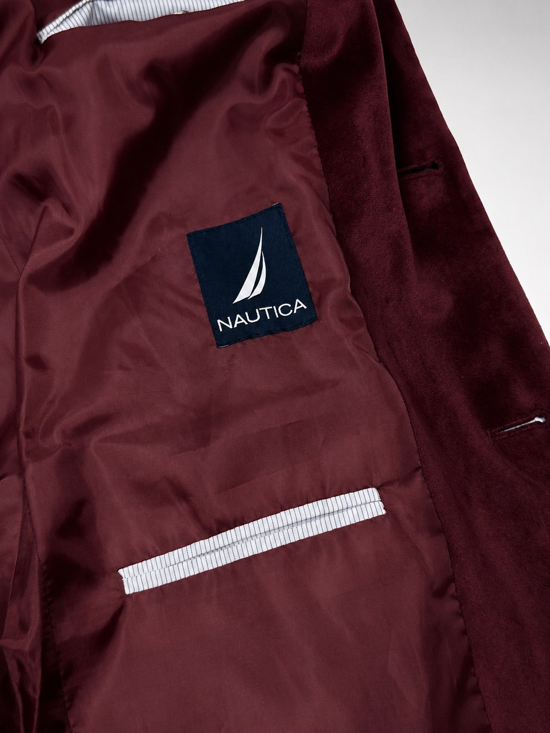 Nautica velvet blazer buttons and label detail