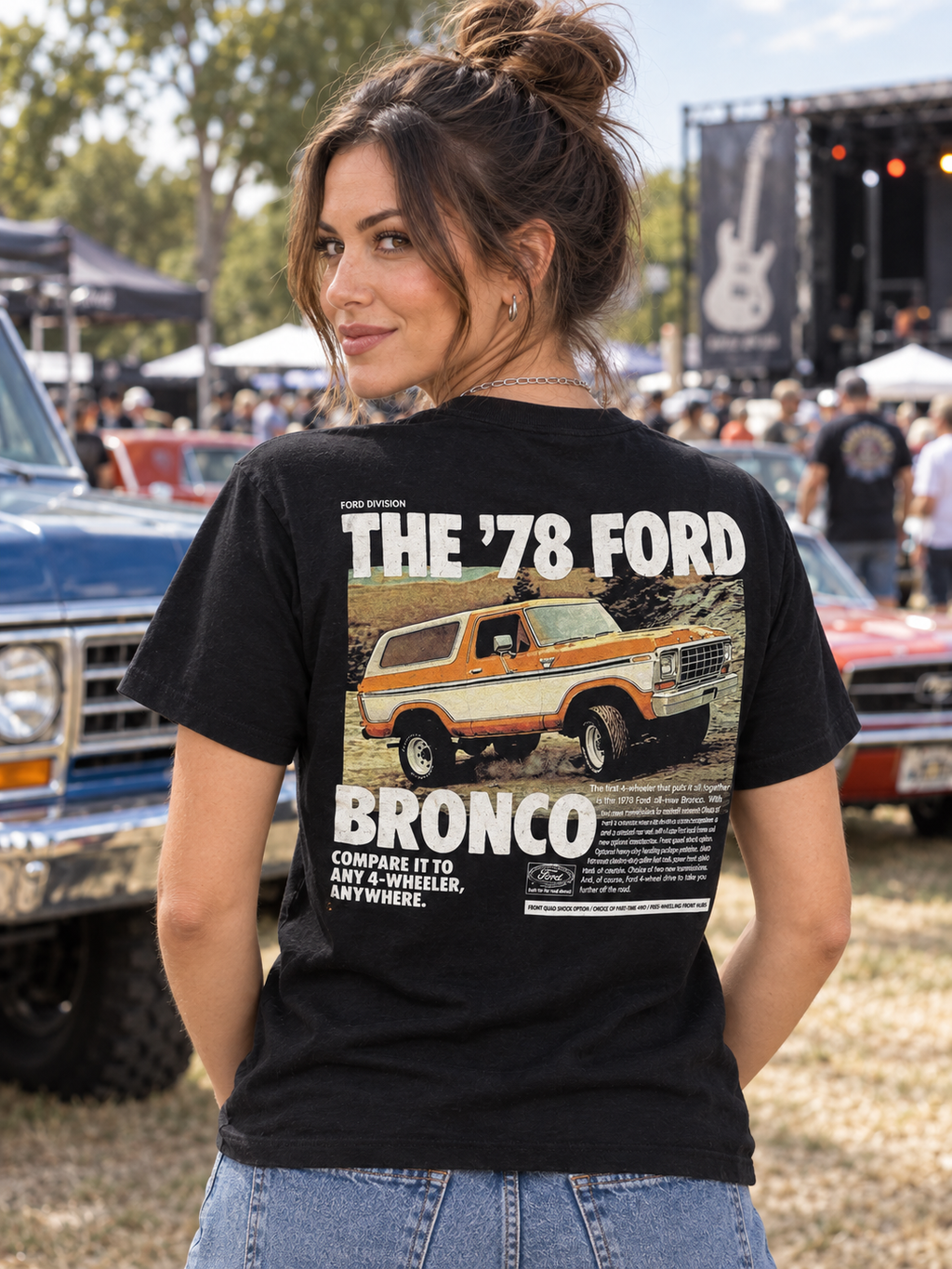 Rear view of black Ford women's '78 Bronco graphic T-shirt with orange SUV illustration